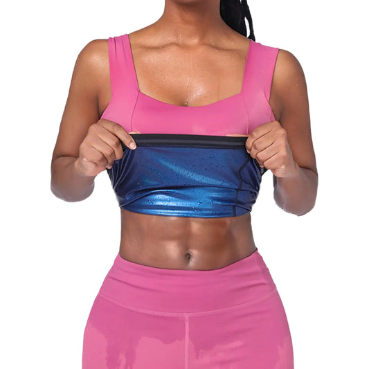 Person wearing a pink sports bra and leggings with a blue athletic top.