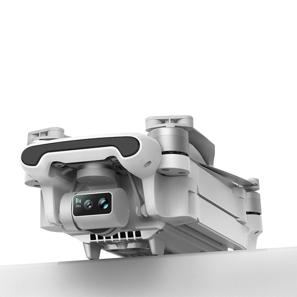 Close-up of a drone camera module on a white background