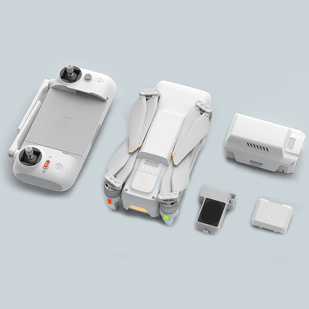 Set of white electronic devices on a light gray background